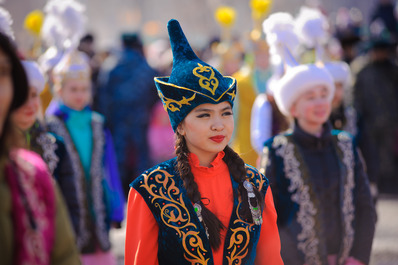 A Kazakh Girl in Traditional Clothing
