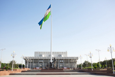 Flag of Uzbekistan in front of Peoples' Friendship Palace